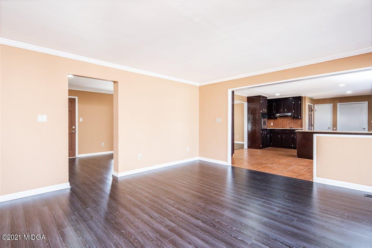 3309 Sandy Circle Macon, GA 31216 - Photo 20 of 35 a view of empty room with wooden floor
