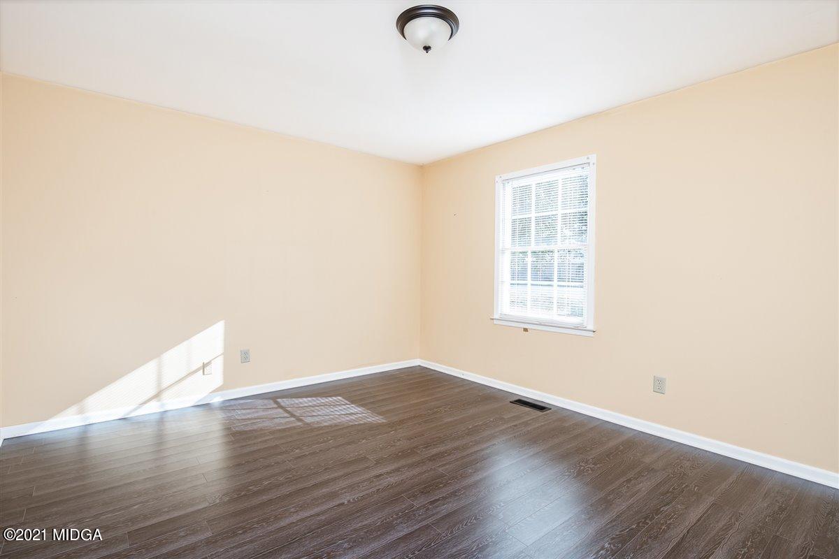 3309 Sandy Circle Macon, GA 31216 - Photo 29 of 35 a view of empty room with wooden floor