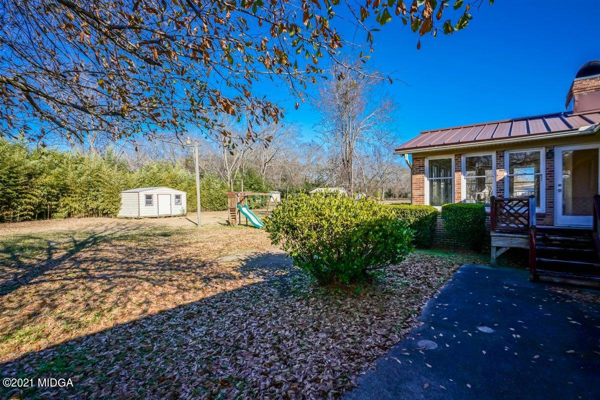 3309 Sandy Circle Macon, GA 31216 - Photo 5 of 35 a view of a house with a yard