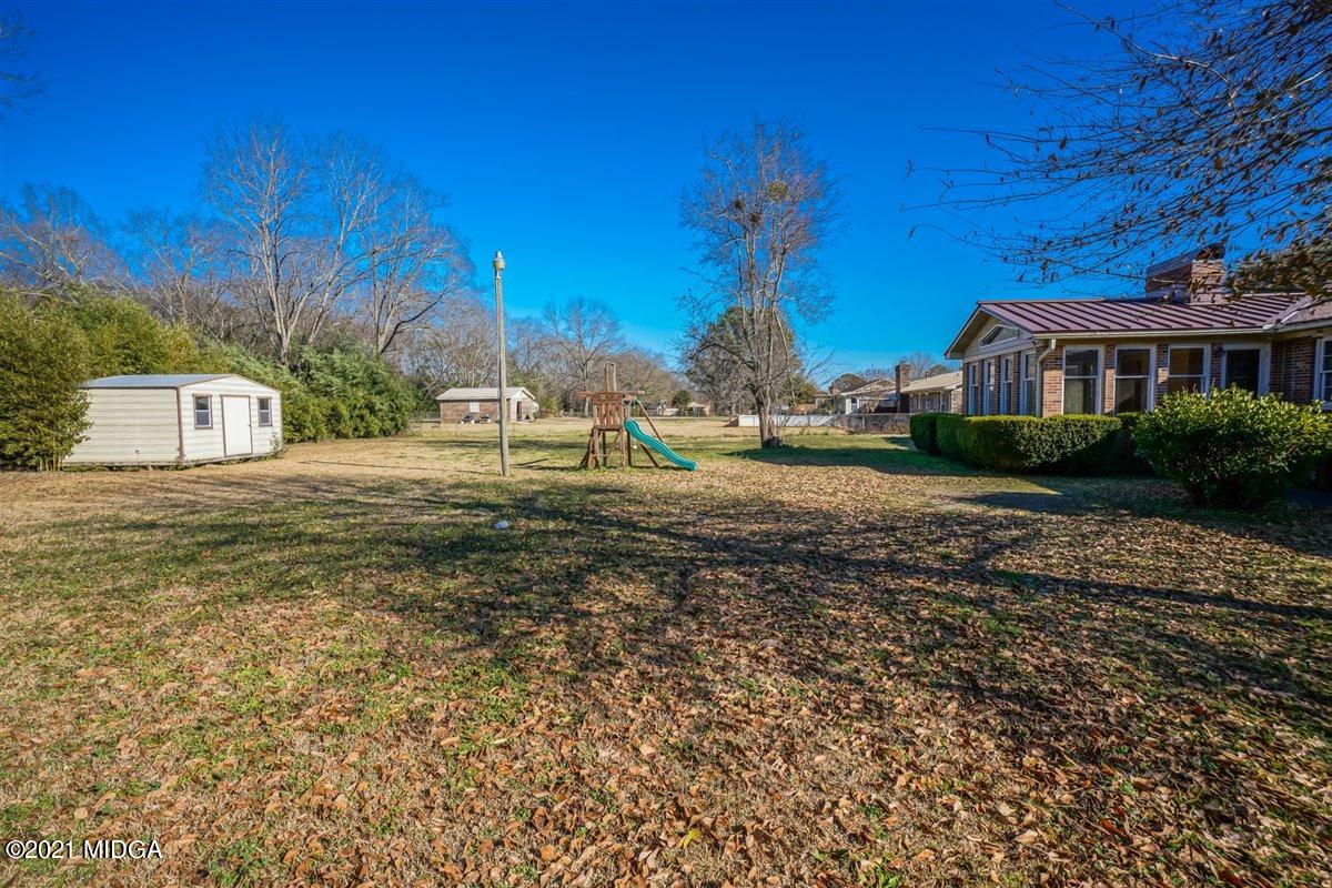 3309 Sandy Circle Macon, GA 31216 - Photo 6 of 35 a view of a house with a yard
