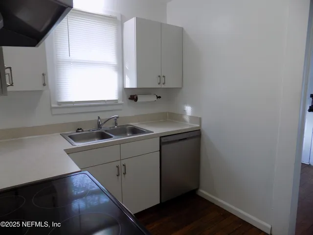 a view of a street with houses
