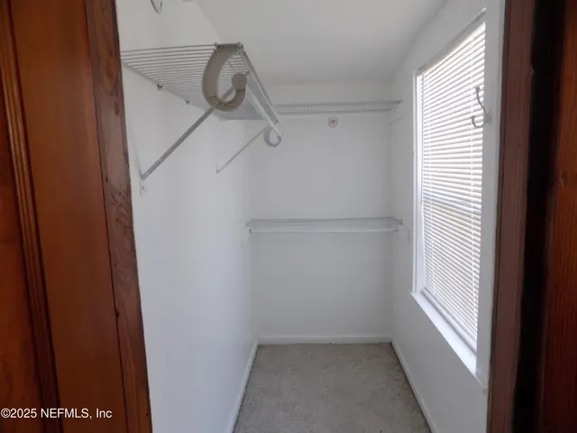 a view of a city street with a apartment