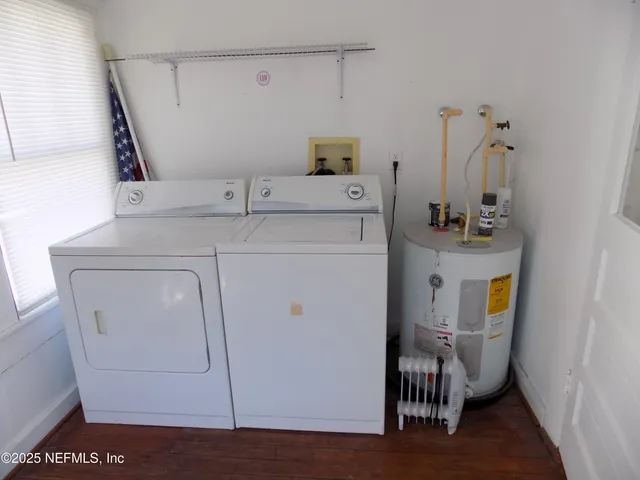 a view of a city street from a building