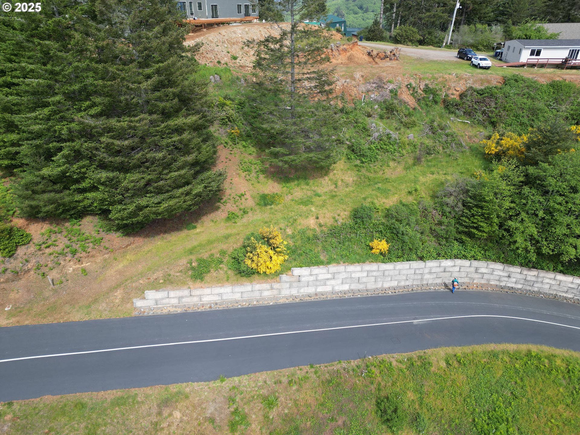 6877 Pacific Terrace Drive Brookings, OR 97415 - Photo 8 of 16 a view of a yard street from a window