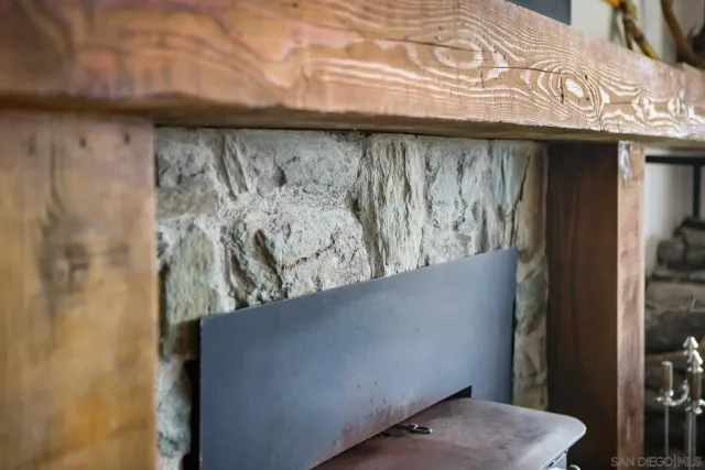 a room with lots of furniture and a large window