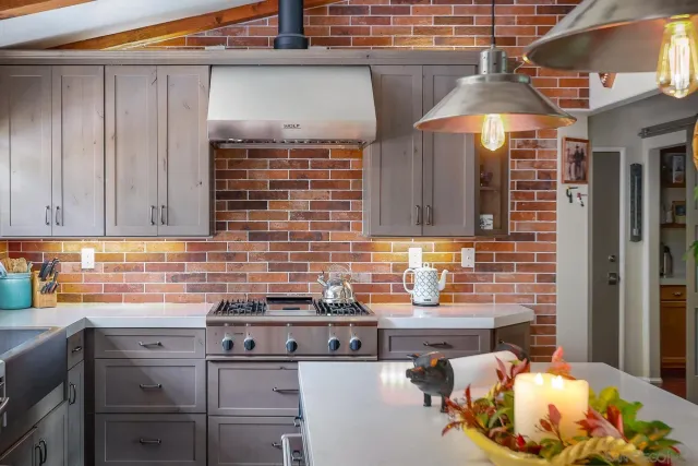 a view of kitchen island a sink and living room view