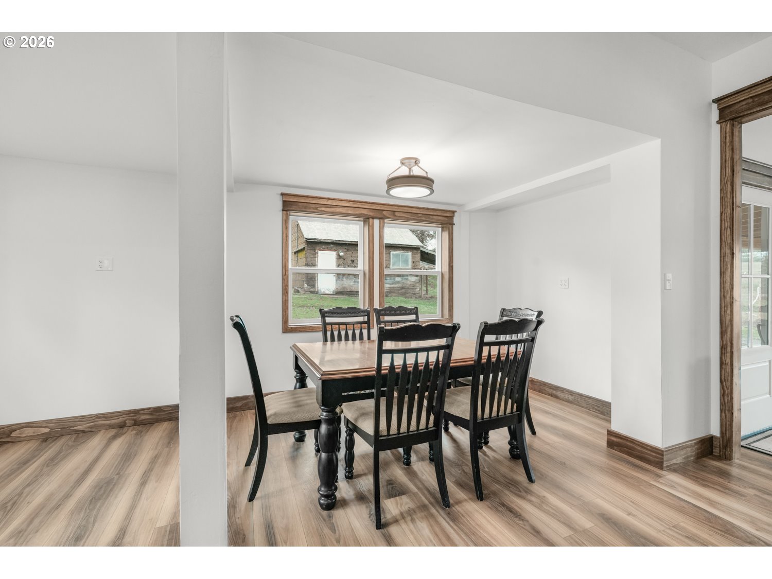 932 Zelinski Road Goldendale, WA 98620 - Photo 19 of 40 a view of a dining room with furniture window and wooden floor