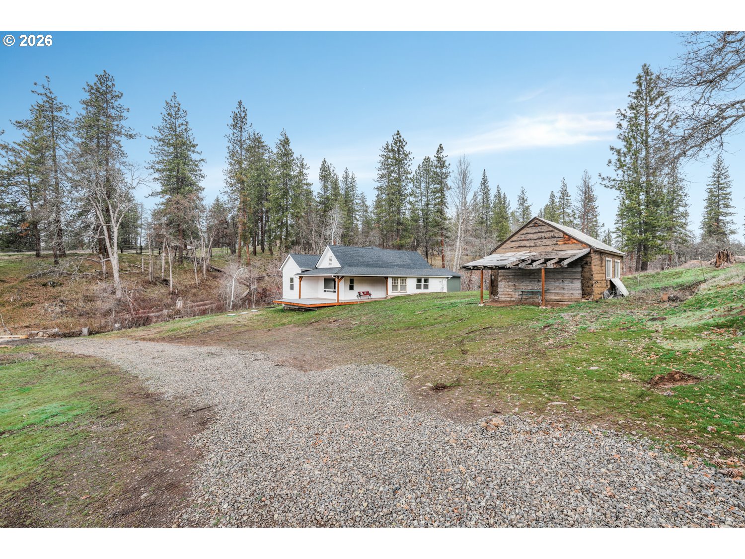 932 Zelinski Road Goldendale, WA 98620 - Photo 2 of 40 a view of a house with yard and trees in the background