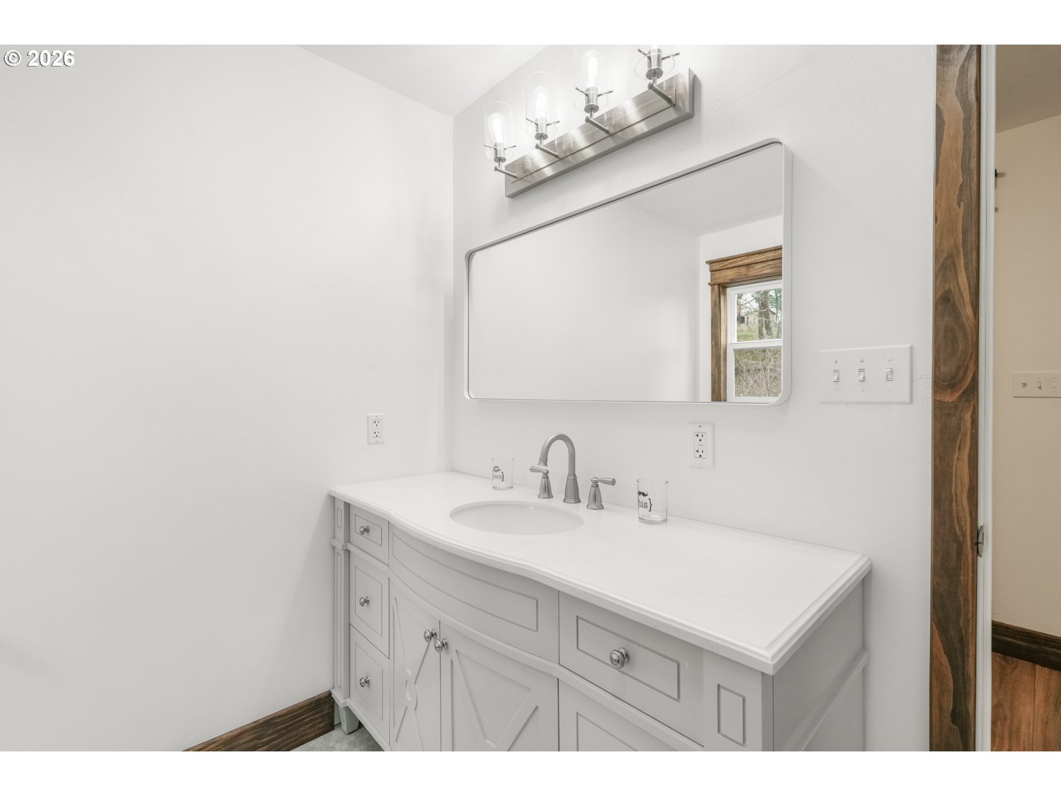 932 Zelinski Road Goldendale, WA 98620 - Photo 25 of 40 a bathroom with a sink vanity and a mirror