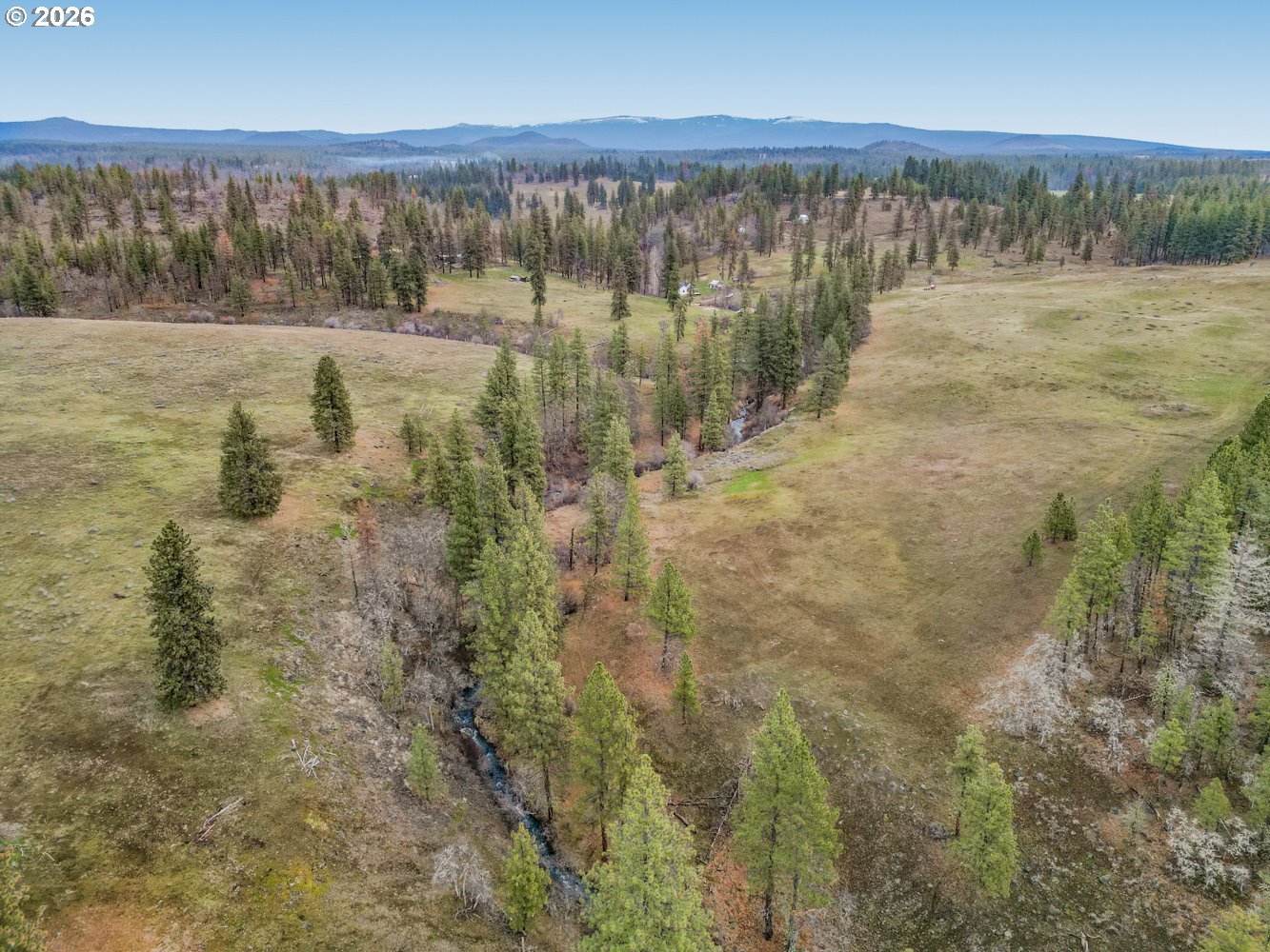 932 Zelinski Road Goldendale, WA 98620 - Photo 7 of 40 a view of lake with green landscape