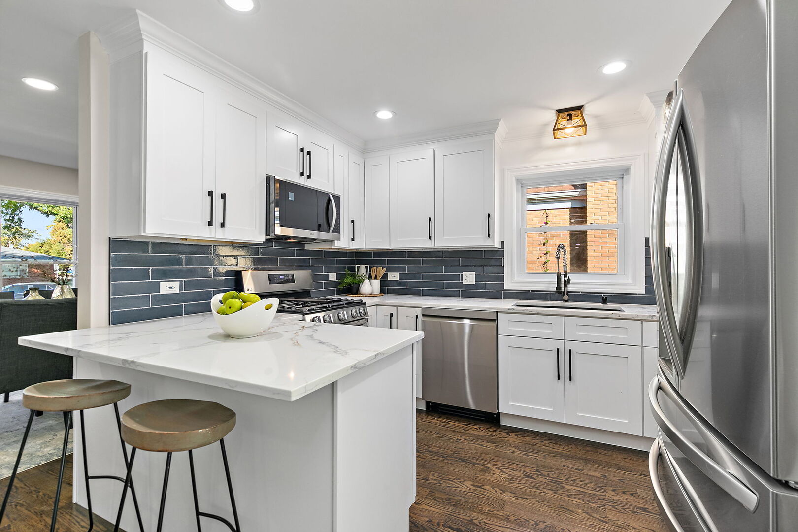 241 North Hamlin Avenue Park Ridge, IL 60068 - Photo 13 of 52 a kitchen with stainless steel appliances granite countertop a refrigerator a stove top oven a sink and dishwasher