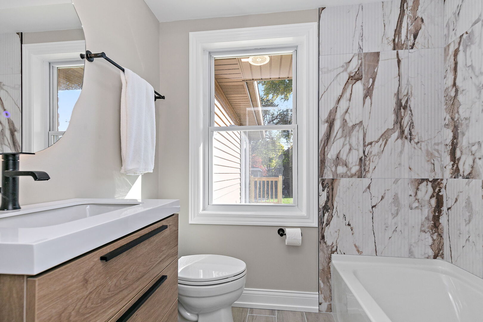 241 North Hamlin Avenue Park Ridge, IL 60068 - Photo 20 of 52 a bathroom with a sink toilet and shower