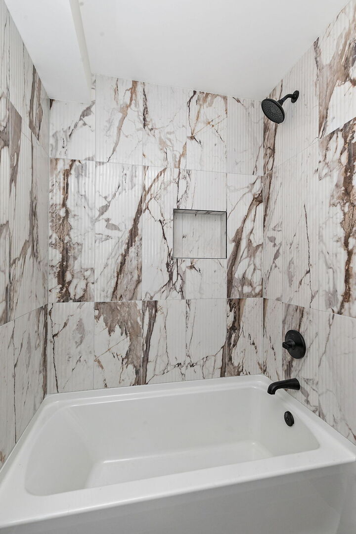 241 North Hamlin Avenue Park Ridge, IL 60068 - Photo 22 of 52 a bathroom with a bathtub and shower
