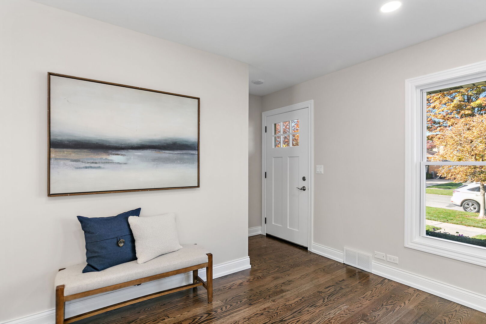 241 North Hamlin Avenue Park Ridge, IL 60068 - Photo 7 of 52 a living room with couch and a window