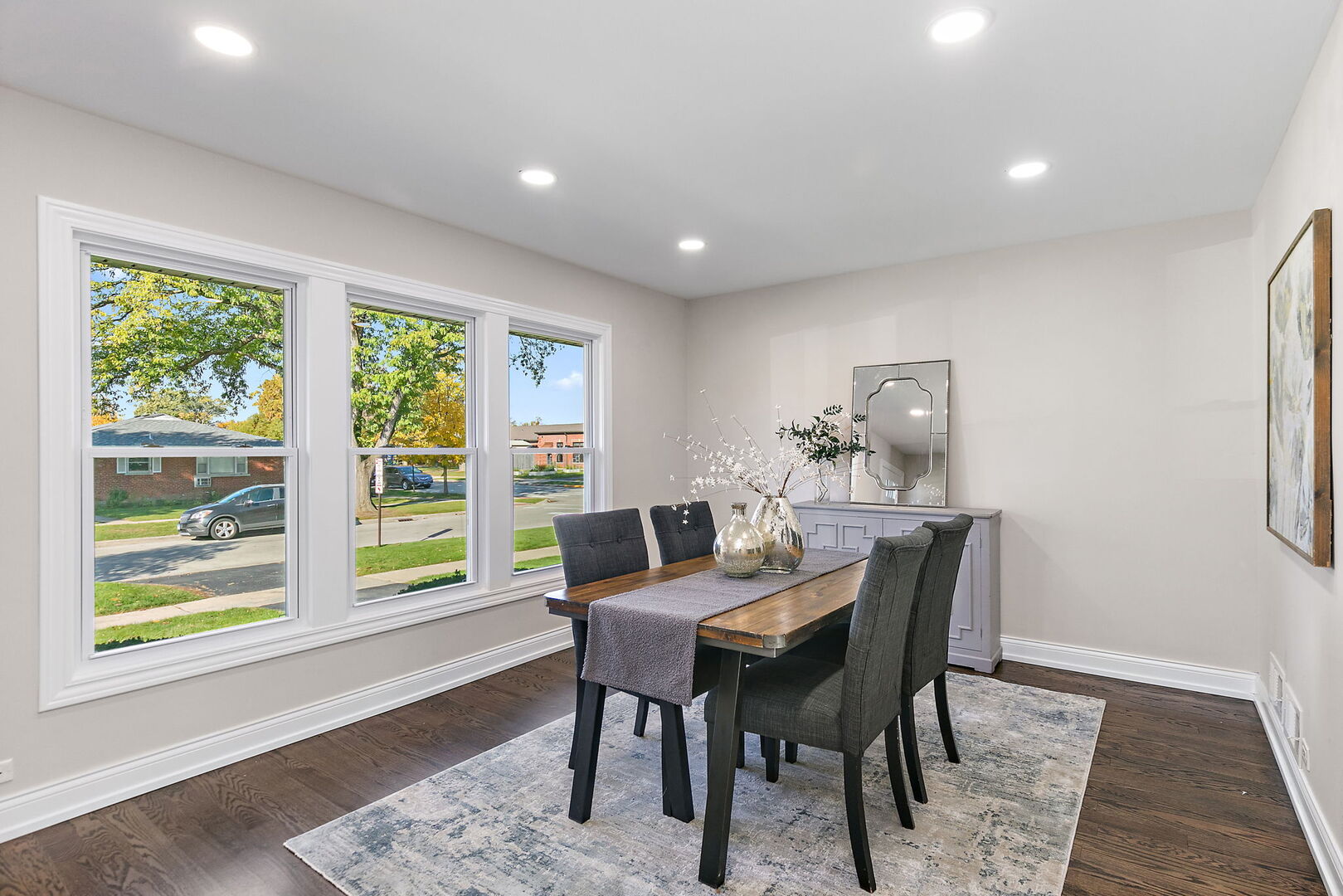 241 North Hamlin Avenue Park Ridge, IL 60068 - Photo 9 of 52 a view of a dining room with furniture a rug and wooden floor