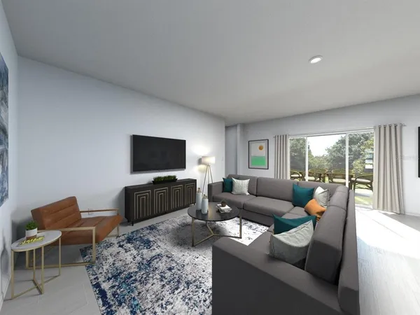 a living room with furniture and a flat screen tv