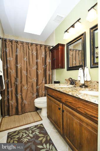 7723 Huntsman Boulevard Springfield, VA 22153 - Photo 19 of 29 Bath #2 features granite & upgraded ceramic floors
