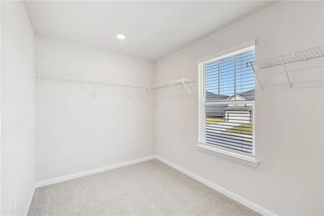 a view of empty room with windows