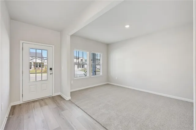 an empty room with windows