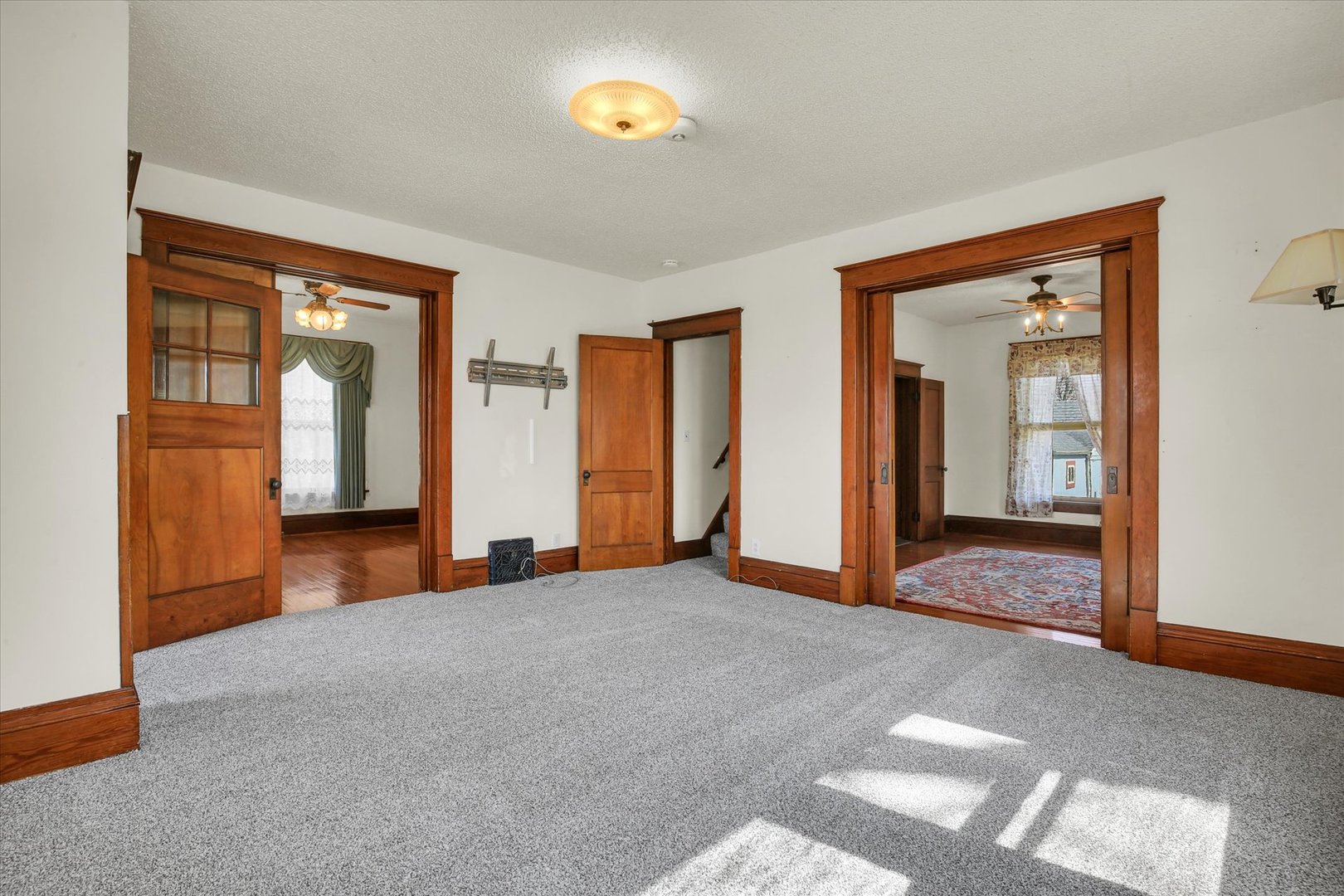 430 Indiana Avenue De Land, IL 61839 - Photo 11 of 48 a view of an empty room with window and wooden floor