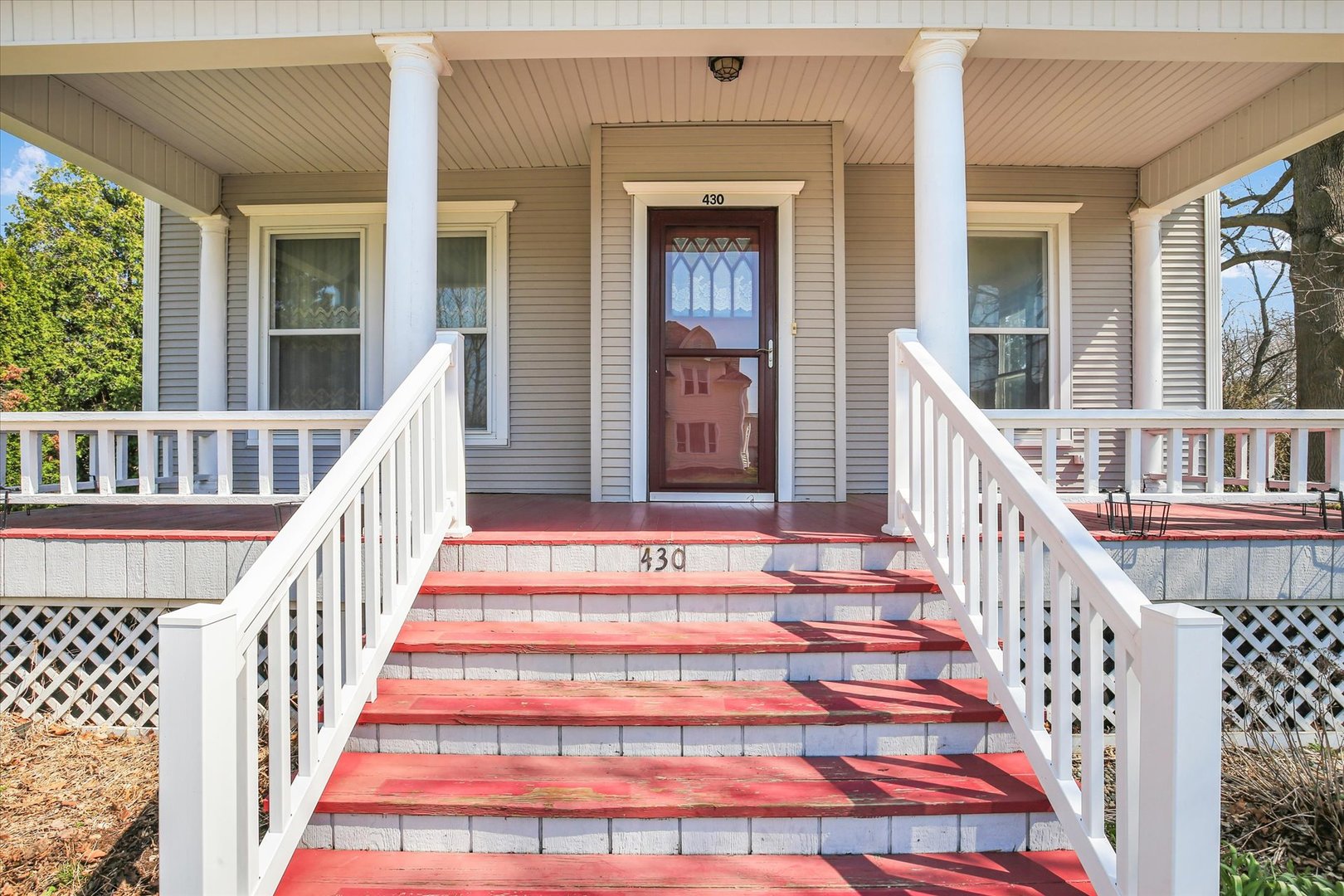 430 Indiana Avenue De Land, IL 61839 - Photo 2 of 48 a view of staircase with railing and a rug