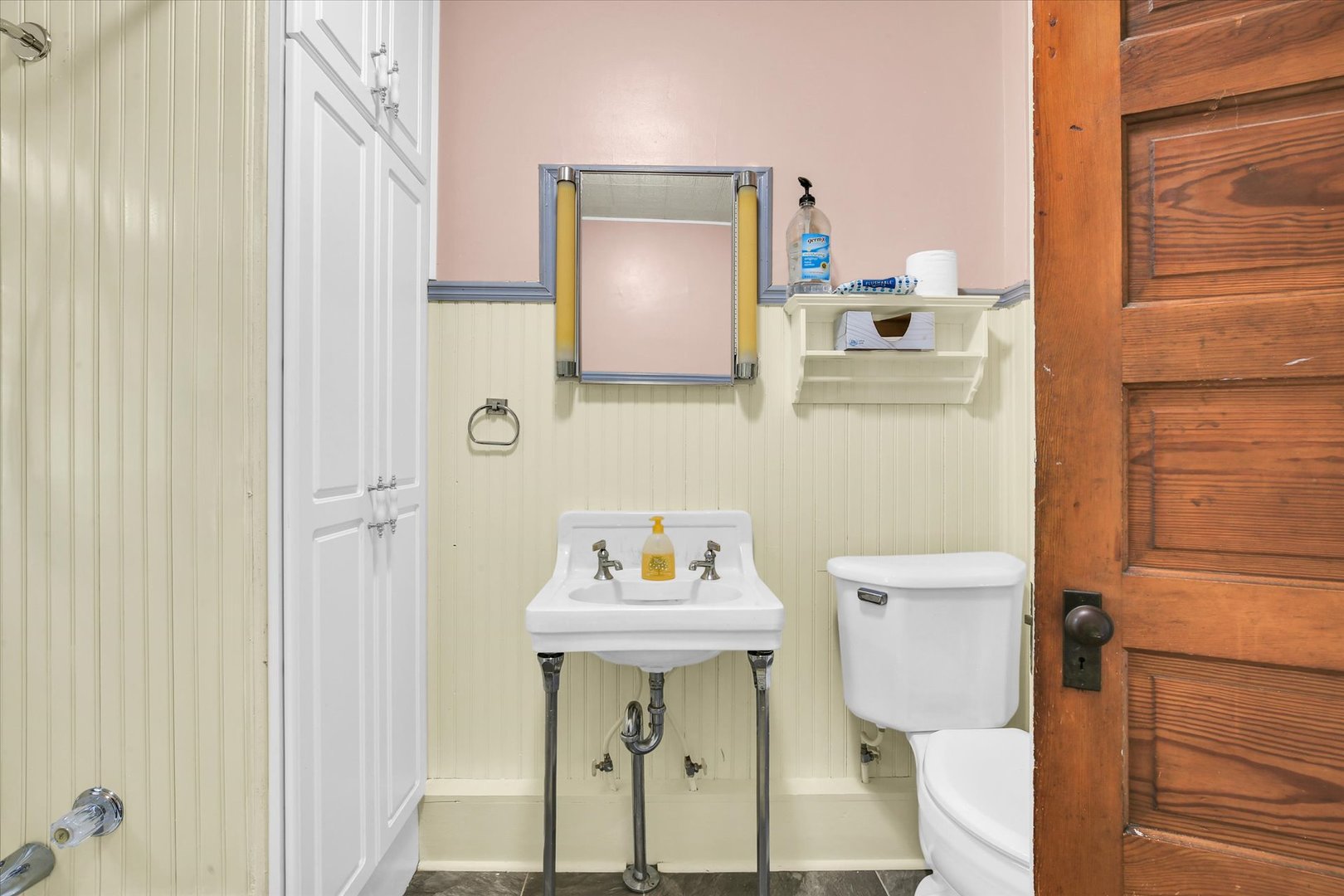 430 Indiana Avenue De Land, IL 61839 - Photo 23 of 48 a bathroom with a sink a toilet and mirror