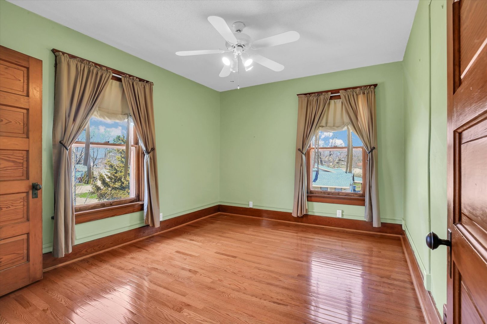 430 Indiana Avenue De Land, IL 61839 - Photo 26 of 48 wooden floor in an empty room with a window