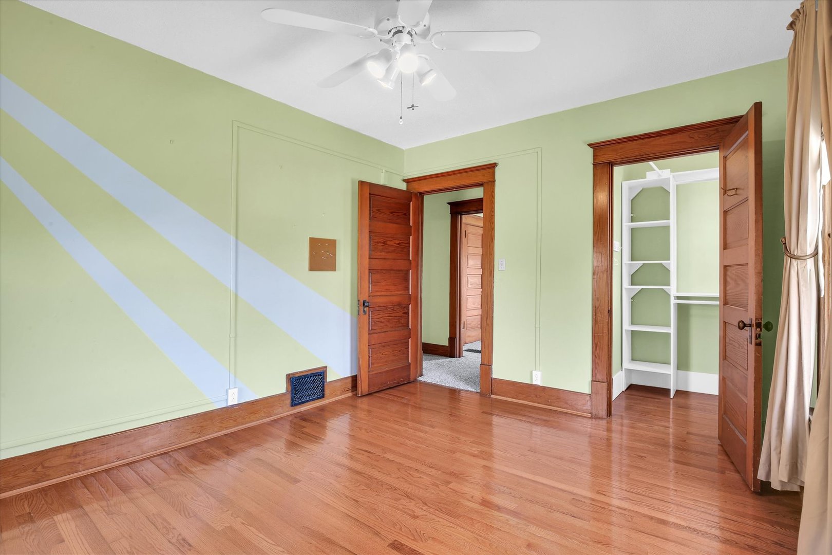 430 Indiana Avenue De Land, IL 61839 - Photo 27 of 48 wooden floor in an empty room with a window