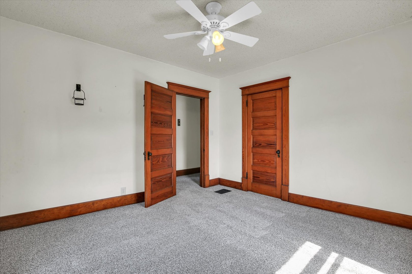 430 Indiana Avenue De Land, IL 61839 - Photo 29 of 48 an empty room with closet and fan