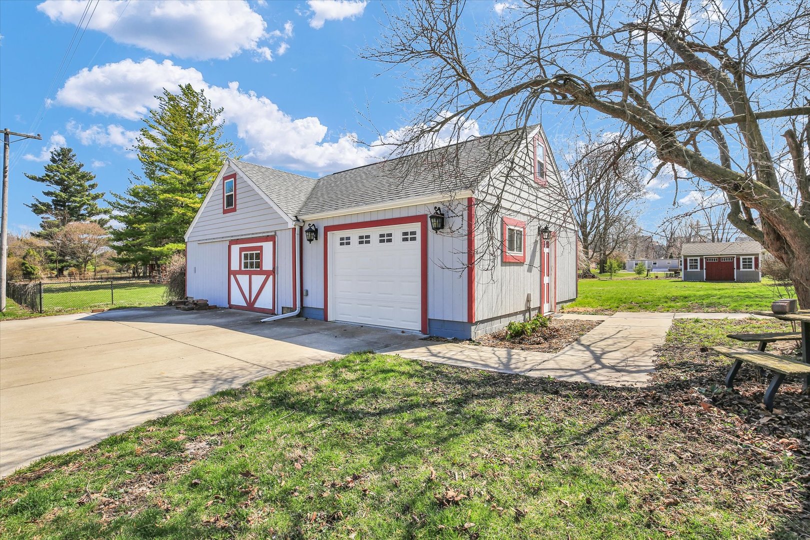 430 Indiana Avenue De Land, IL 61839 - Photo 38 of 48 a view of a house with a yard and garage