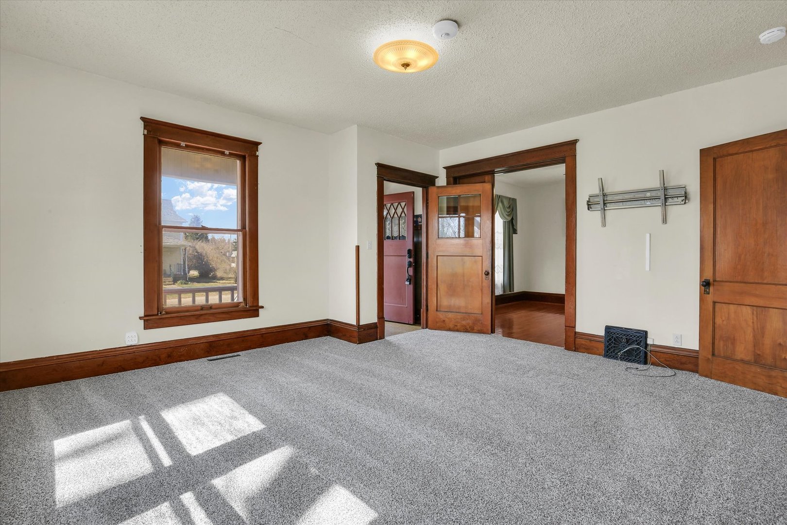 430 Indiana Avenue De Land, IL 61839 - Photo 10 of 48 a view of an empty room with a window