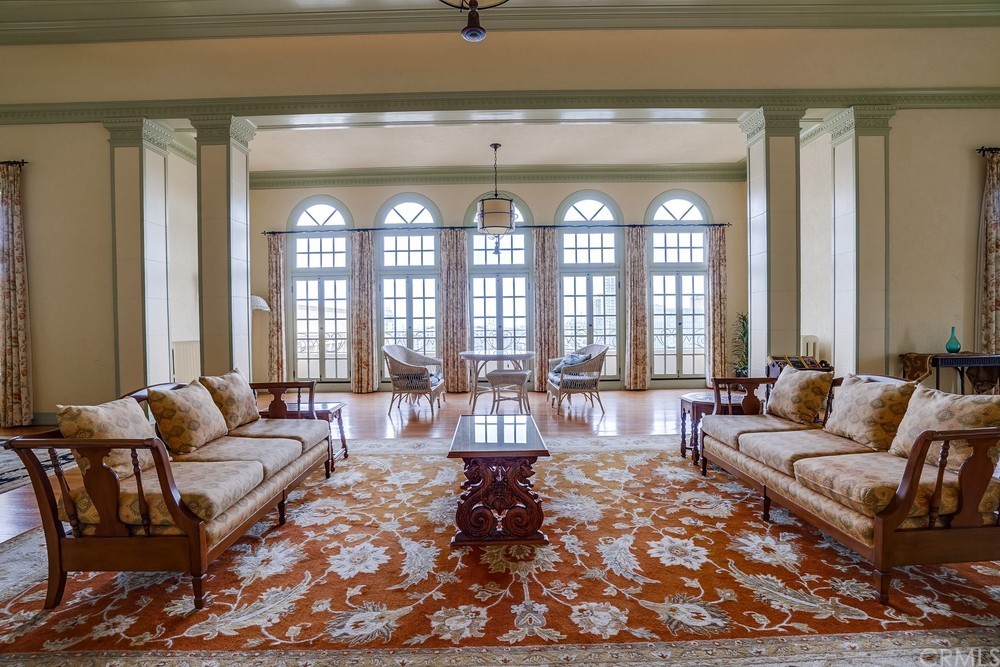 315 West 3rd Street, Unit 507 Long Beach, CA 90802 - Photo 18 of 25 a living room with furniture and a large window