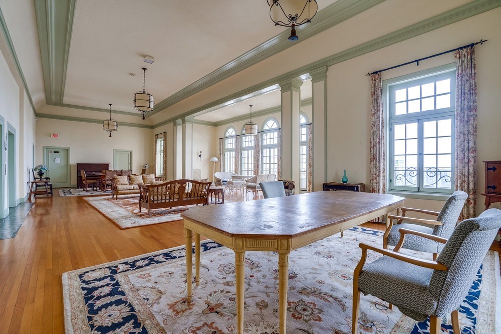 315 West 3rd Street, Unit 507 Long Beach, CA 90802 - Photo 19 of 25 a room with dining table and a chandelier