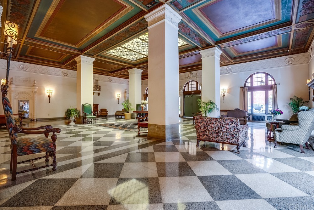 315 West 3rd Street, Unit 507 Long Beach, CA 90802 - Photo 4 of 25 a room with lots of white furniture and a rug