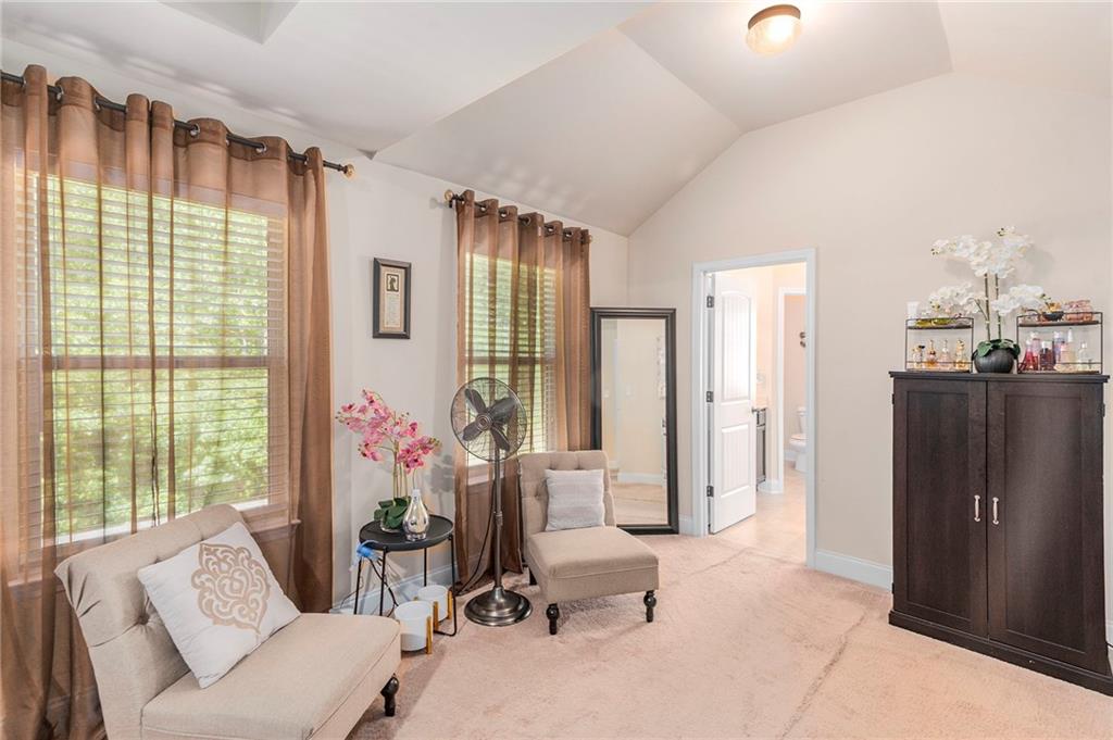 1419 Stone Ridge Court Hampton, GA 30228 - Photo 20 of 31 a living room with furniture and a window