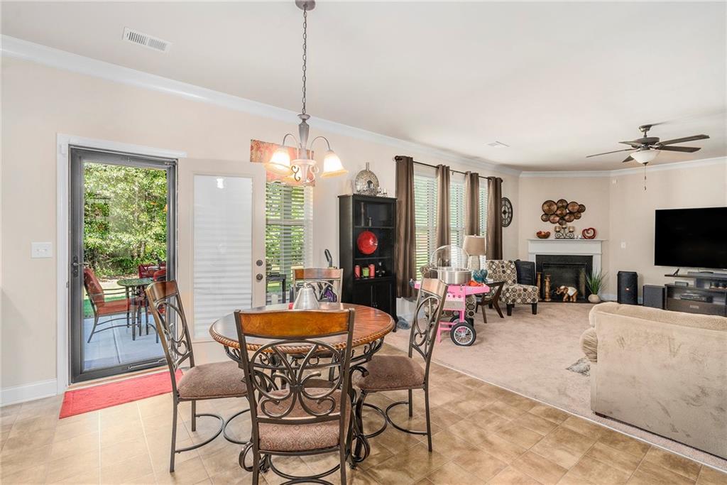 1419 Stone Ridge Court Hampton, GA 30228 - Photo 10 of 31 a view of a dining room with furniture window and outside view