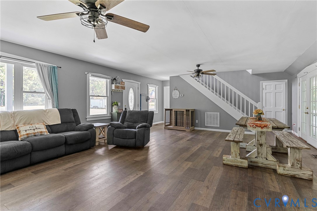 80 Mill Ridge Road Hartfield, VA 23071 - Photo 8 of 43 Expansive living area featuring wood-finish floori