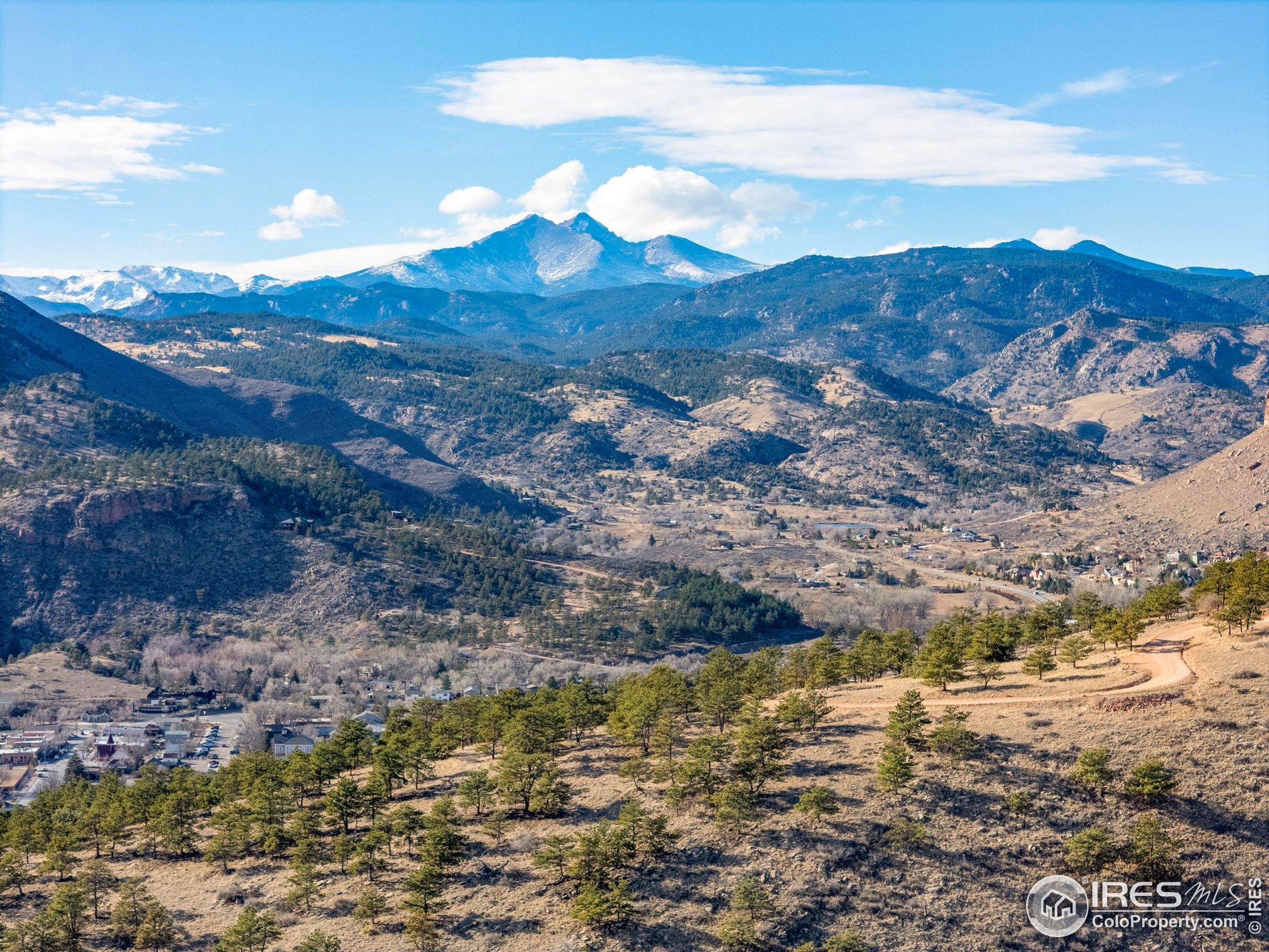 1285 Eagle Ridge Road Lyons, CO 80540 - Photo 18 of 22 a view of mountains in middle of the forest