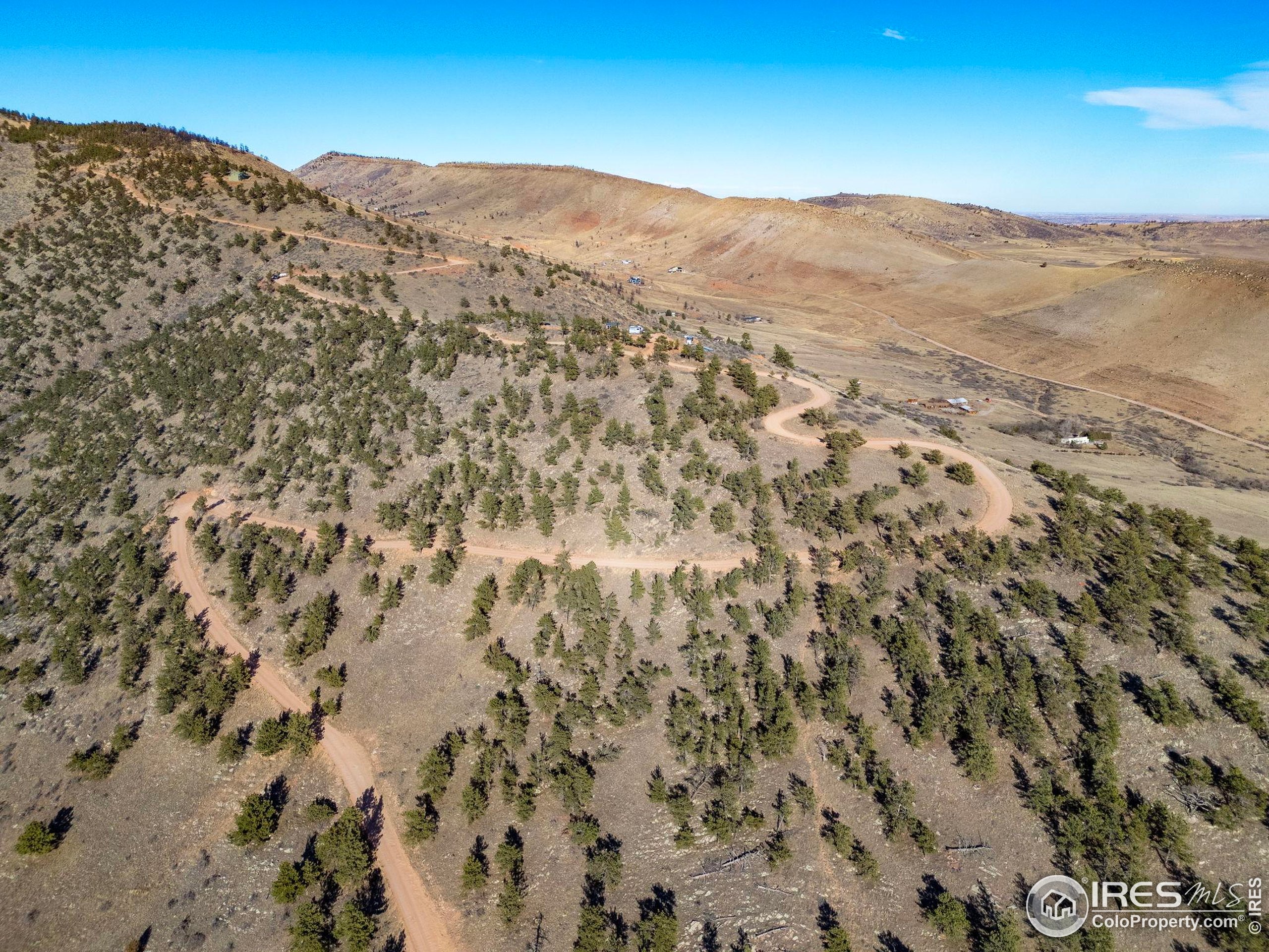 1285 Eagle Ridge Road Lyons, CO 80540 - Photo 8 of 22 a view of a large mountain with mountains in the background