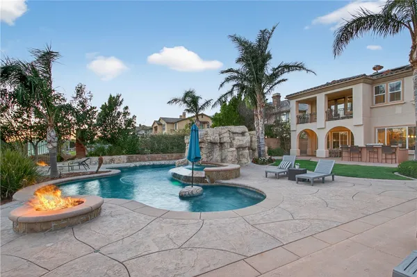a view of a backyard with a patio