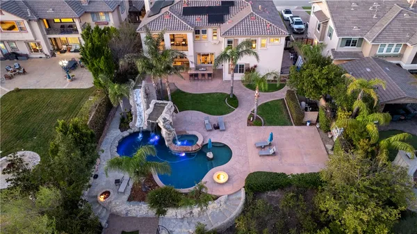 an aerial view of a houses with outdoor space