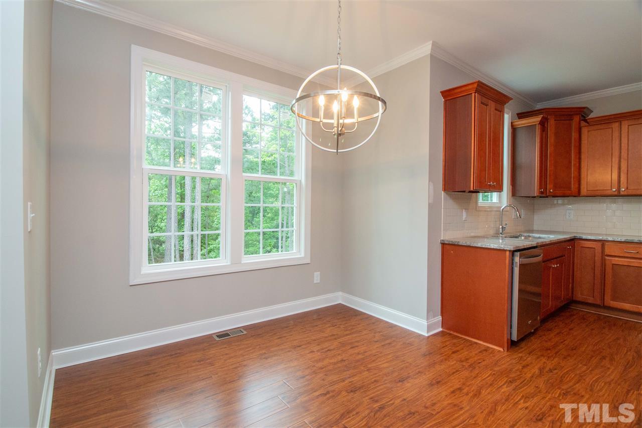 4202 Prelude Street Raleigh, NC 27616 - Photo 11 of 21 Notice the light fixtures throughout.. quality finishes!