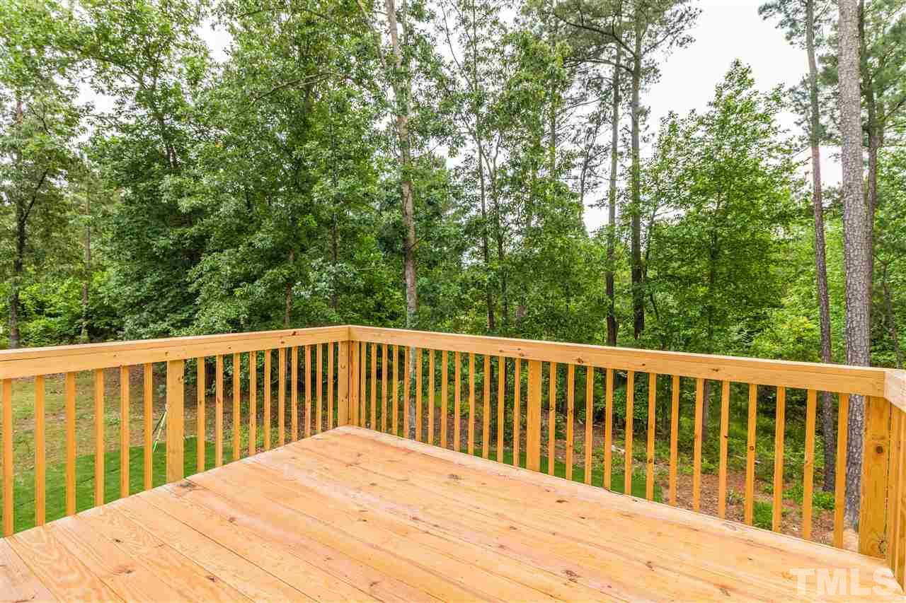 4202 Prelude Street Raleigh, NC 27616 - Photo 21 of 21 Wooded back yard with private view