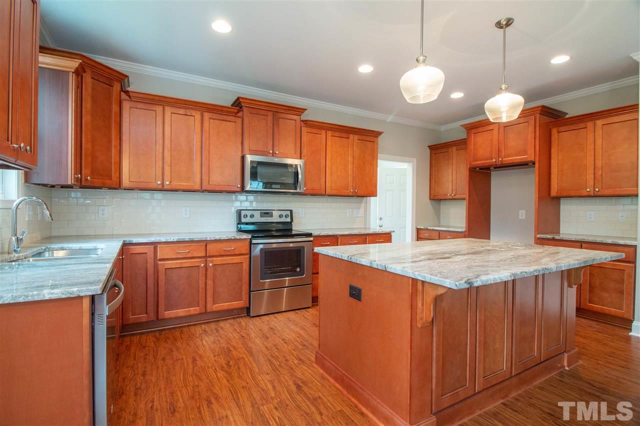 4202 Prelude Street Raleigh, NC 27616 - Photo 6 of 21 Look at all of these cabinets! Stainless steel appliances include SS dishwasher (inside and out), convection microwave oven, and smoothtop electric range
