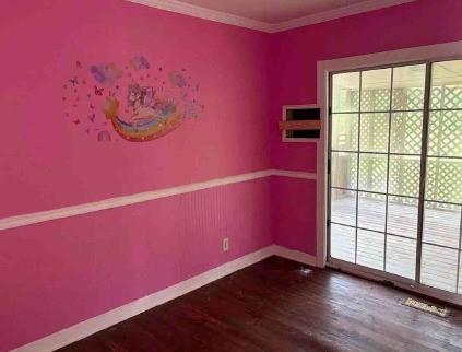 904 Barbara Circle Southwest Moultrie, GA 31768 - Photo 15 of 20 a view of a room with wooden floor and windows