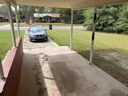 904 Barbara Circle Southwest Moultrie, GA 31768 - Photo 7 of 20 a swimming pool view with a garden space