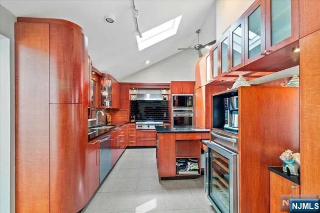 a view of a patio with chairs and a fireplace