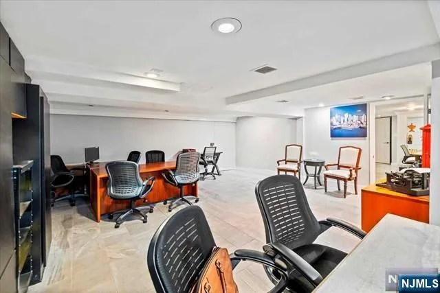 a view of a livingroom with furniture