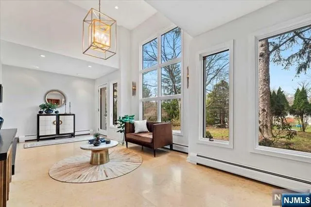 a living room with furniture and a table