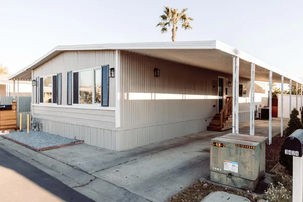 a front view of a house with a garage